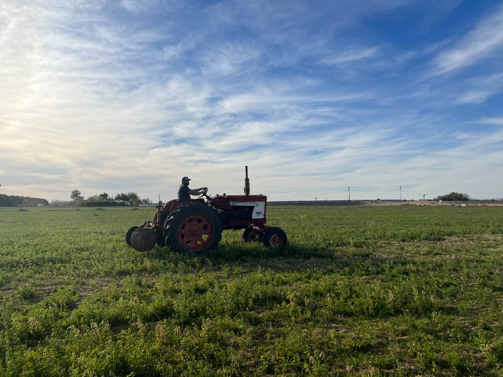 Tractor working the fields at Rancho La Capillita